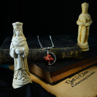 Merkaba medál fémmel Szintetikus Napkő vörös 2x3cm