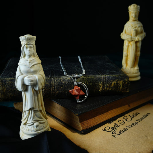 Merkaba medál fémmel Szintetikus Napkő vörös 2x3cm